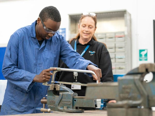 Engineering student using equipment