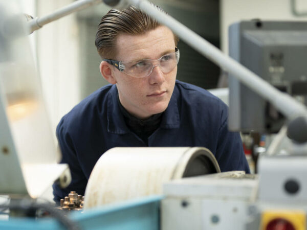 Engineering student using equipment