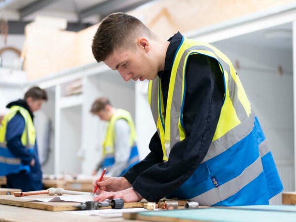 Plumbing student working