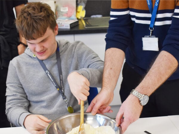 Additional Learning Support student working on their cooking skills