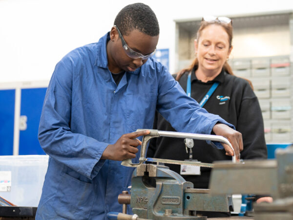 Engineering student using equipment