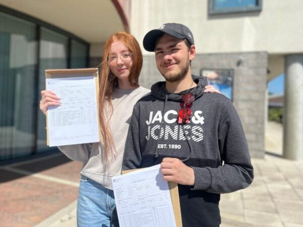 Lilijana and Jacob receiving their results.