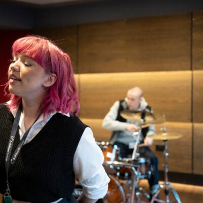 Tash singing in one of the recording studios
