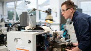 Engineering student using equipment