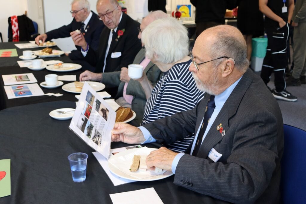 Guests enjoying aftertoon tea in aid of remembrance