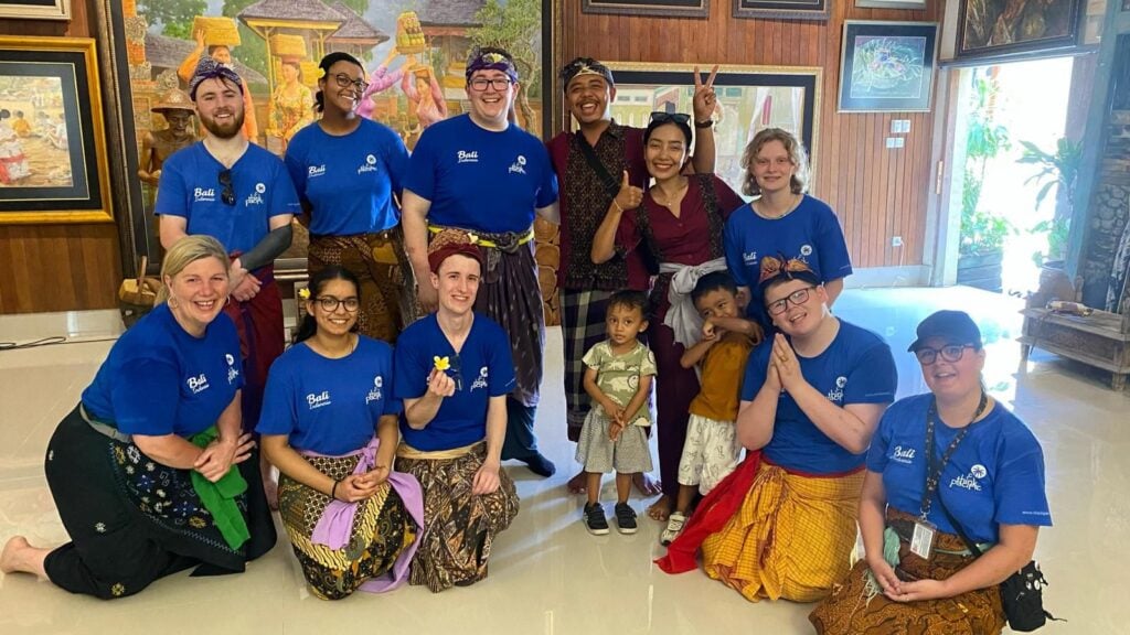 a group photo of students in Bali