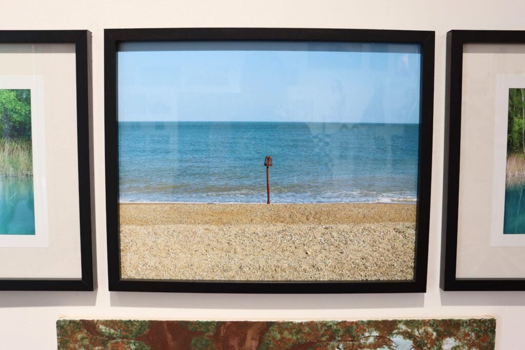 Photo in frame showing a beach