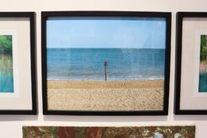 Photo in frame showing a beach