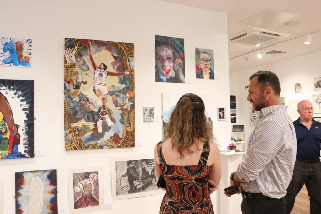 Public enjoying art in gallery