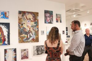 Public enjoying art in gallery
