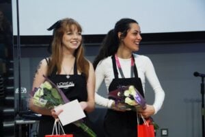 two students at the loreal hairdressing talk