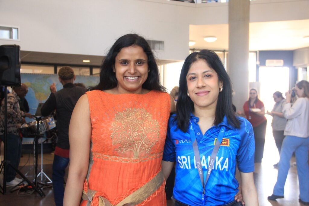 two students one wearing a saree