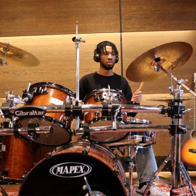 Student playing the drums