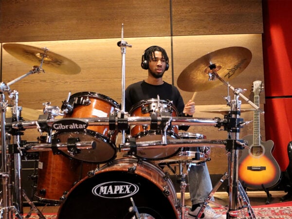 Student playing the drums