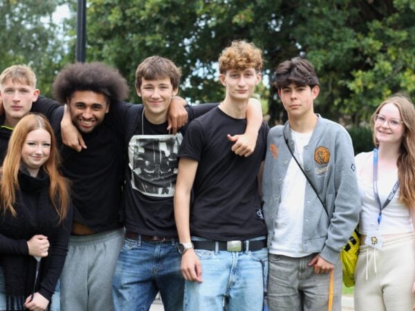 group shot of 7 students smiling