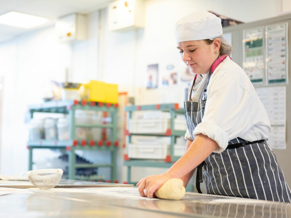 Catering student baking