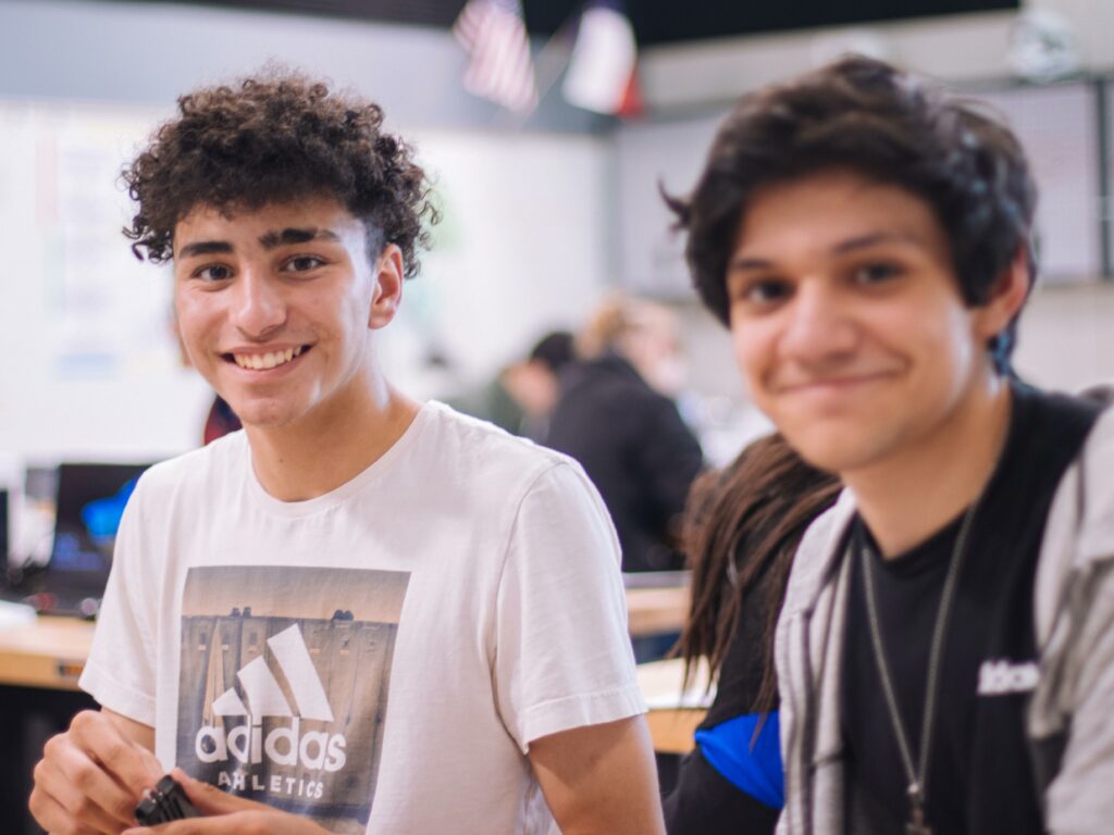 Students smiling at camera