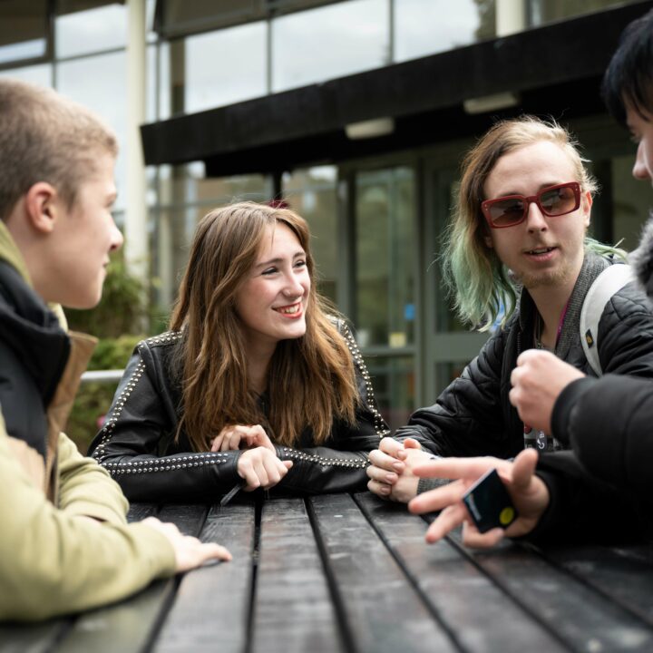 Students sat outside chatting