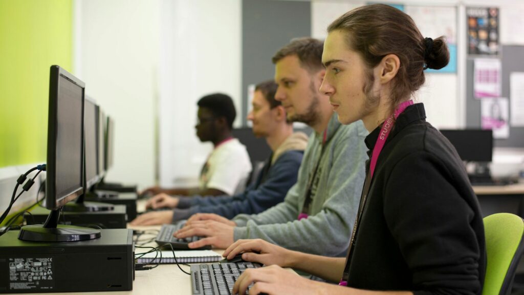 Computing students using computers