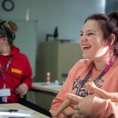 Early Years student smiling in lesson