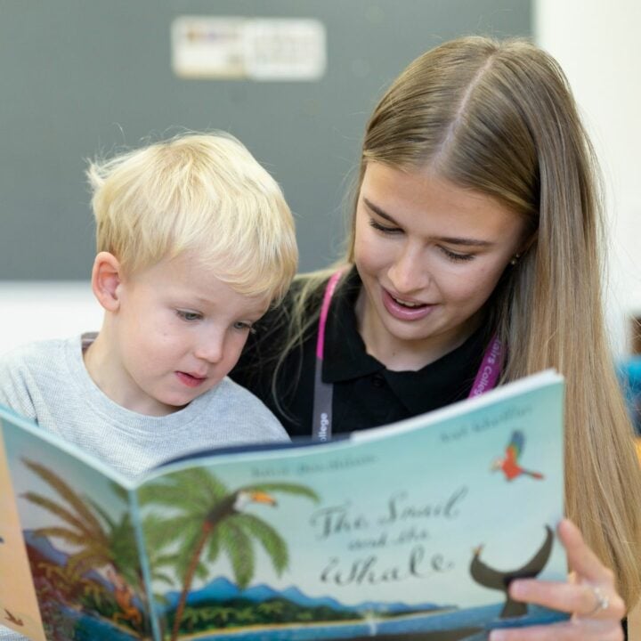 Education and Early Years student reading to child