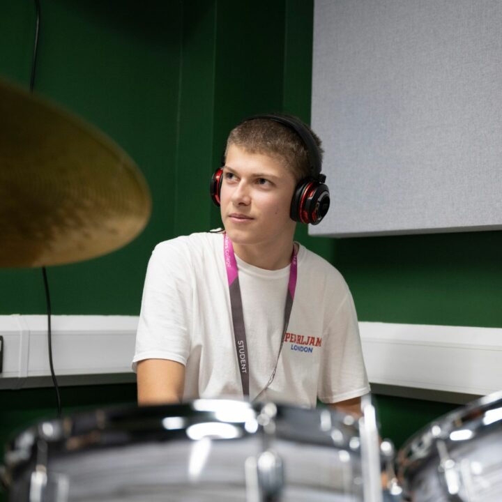 Music student playing the drums