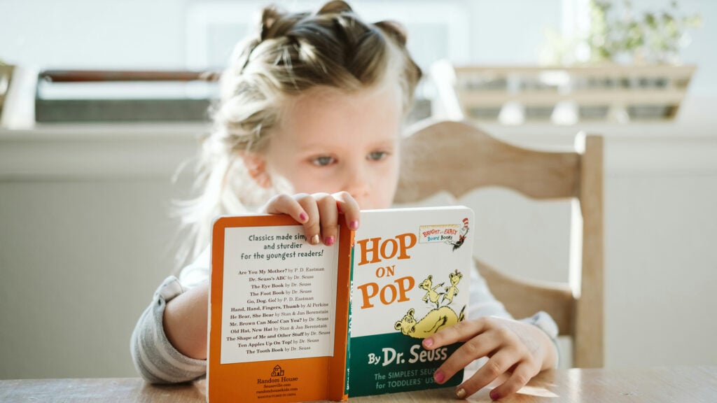 Child reading a book