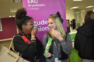 student's union students laugh together