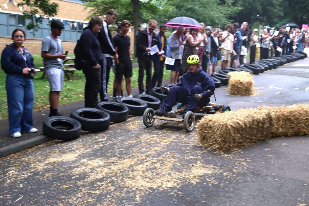 student in a soapbox race