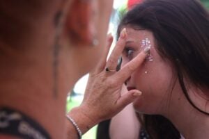 student gets face glitter on face