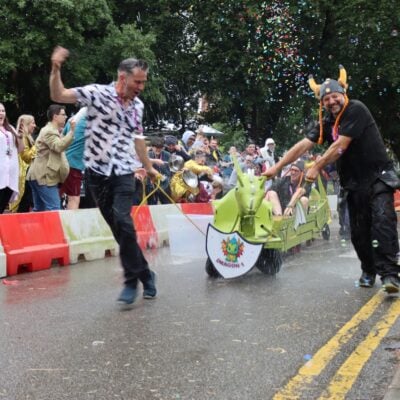 staff at the college race in a soapbox race