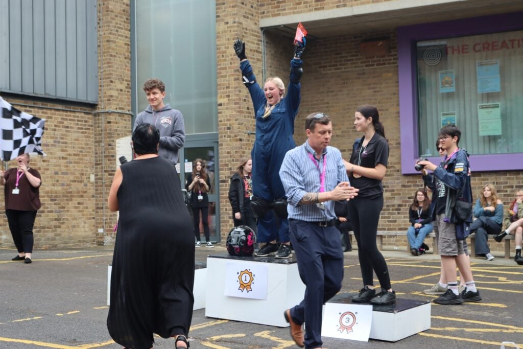 female student wins a soapbox race