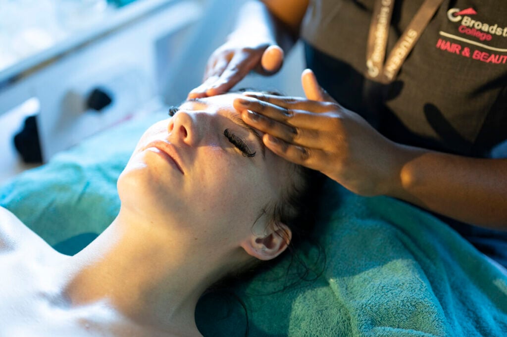 Close up image of a lady receiving a facial