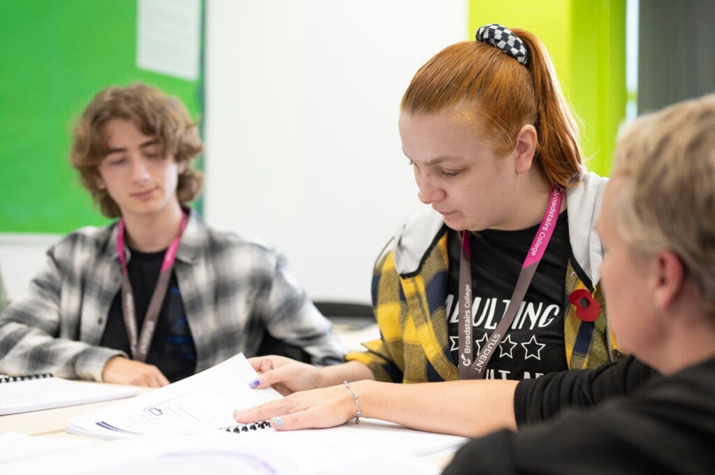 Students in class writing