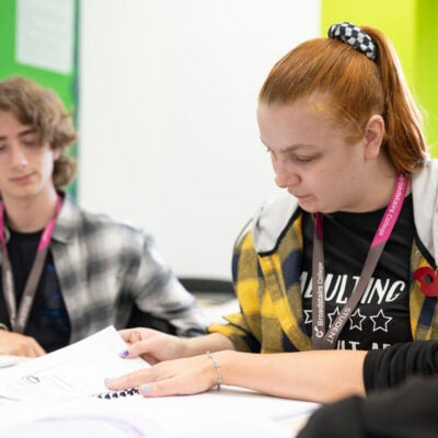 Students in class writing