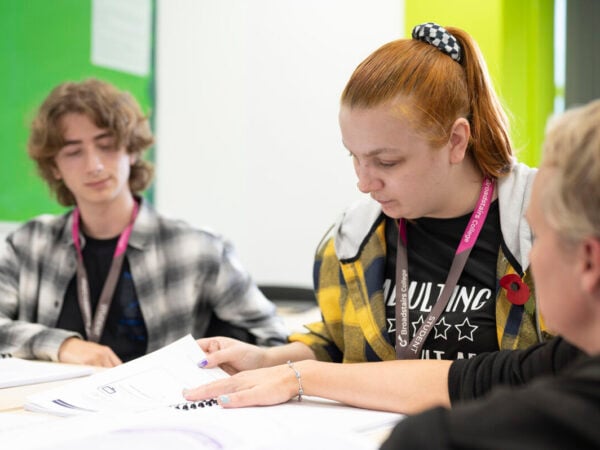 Students in class writing