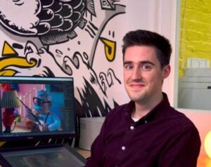 Man sat in front of a computer