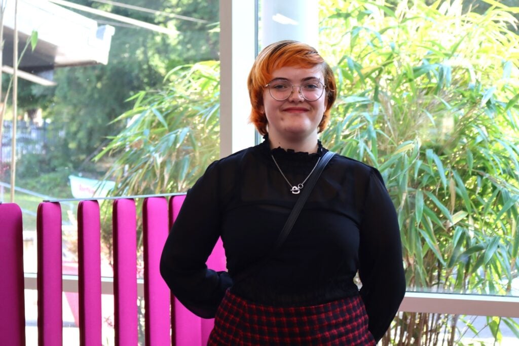 student poses for camera