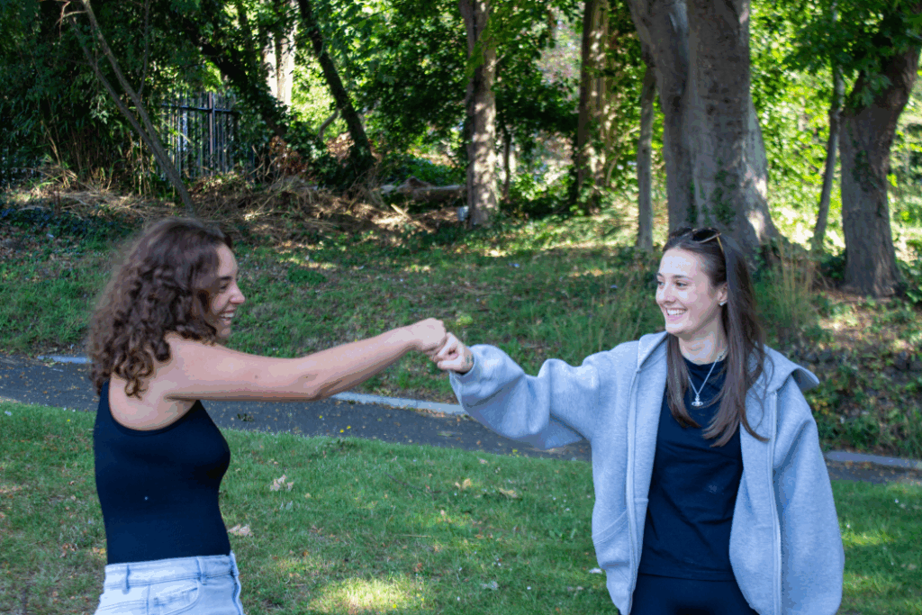 two early years students celebrate on results day