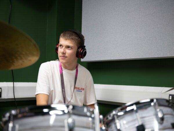 Student playing the drums
