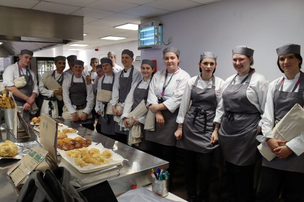A group pf catering students in a kitchen