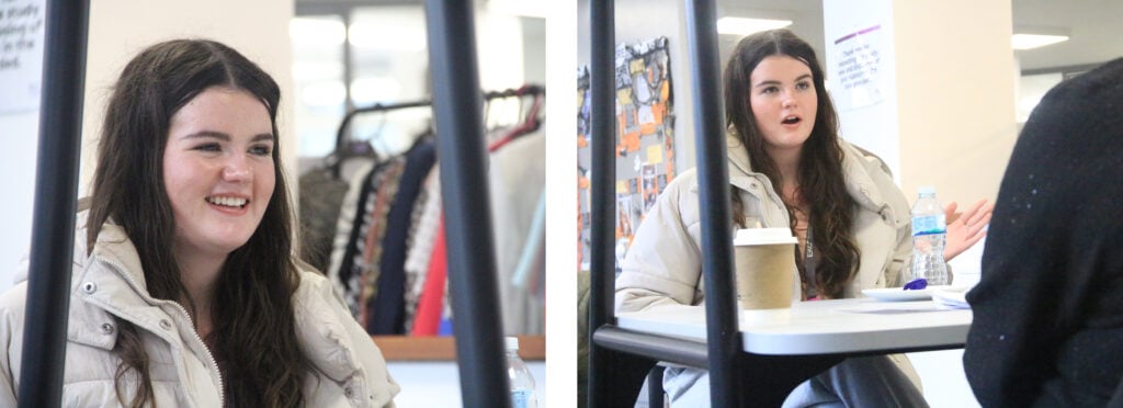 Layla smiling, sat across from the interviewer