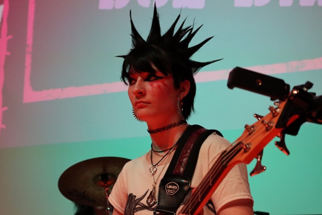 Ava performs in punk show