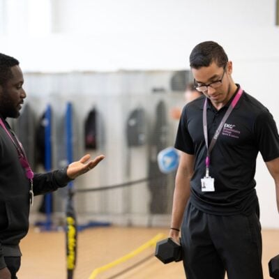 Sport lecturer works with sport student