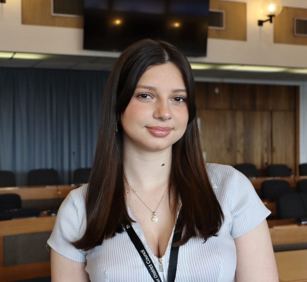 student smiling at the camera
