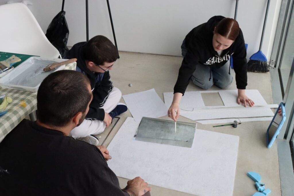 two students collaborate with artist at Turner Contemporary