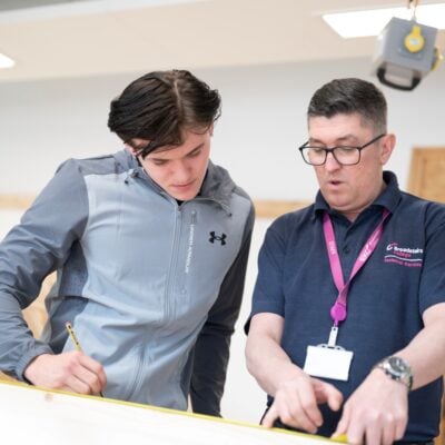 Carpentry student with lecturer at EKC Broadstairs College