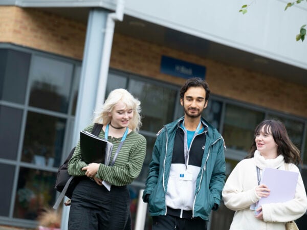 Students walking through the college