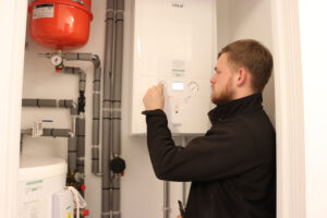 Gas engineer working on a boiler