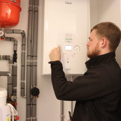 Gas engineer working on a boiler